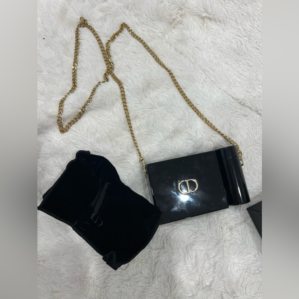 Christian Dior Lipstick pouch on chain. Comes with unused lip sticks.